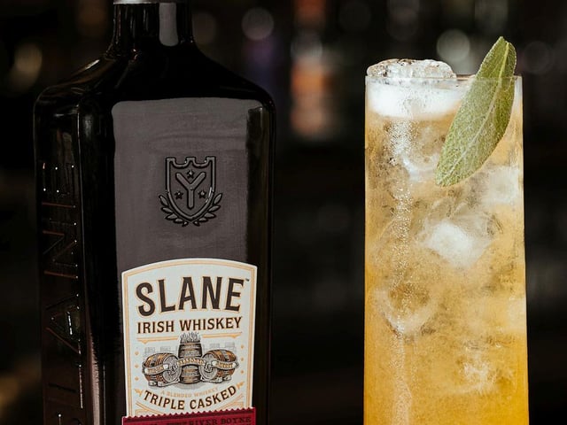 Slane’s Power of Three is a collaboration between Slane Irish Whiskey and Sunday Brunch Mixologist Pritesh Moody, to create a delicious refreshing drink with three core ingredients: whiskey, apricot and crémant.
Ingredients: 50ml Slane Irish Whiskey (£30.03, 70cl, Amazon), 10ml elderflower cordial, 1tsp quality apricot jam, 50ml Crémant de Loire, 2 sage leaves.
Method: Half fill a cocktail shaker with ice. Add the whiskey, jam, one torn sage leaf and elderflower cordial in a cocktail shaker and shake hard. Strain into a highball glass filled with ice, top with Crémant de Loire. Garnish with a sage leaf.