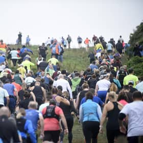Runners tacking the Beachy Head course. Photo: Jon Rigby