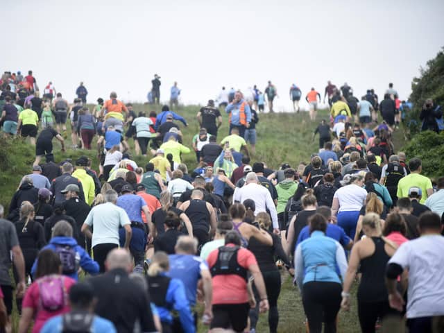 Runners tacking the Beachy Head course. Photo: Jon Rigby