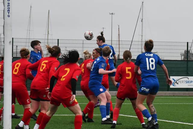Worthing, in blue, in action in their cup semi win at Newhaven | Picture: OneRebelsView