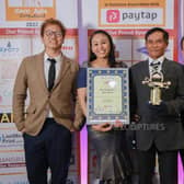 Tik, second from left, with her family and colleagues, at the Euro Asia Curry Awards