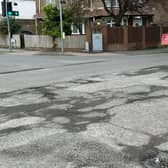 Potholes at a crossroad