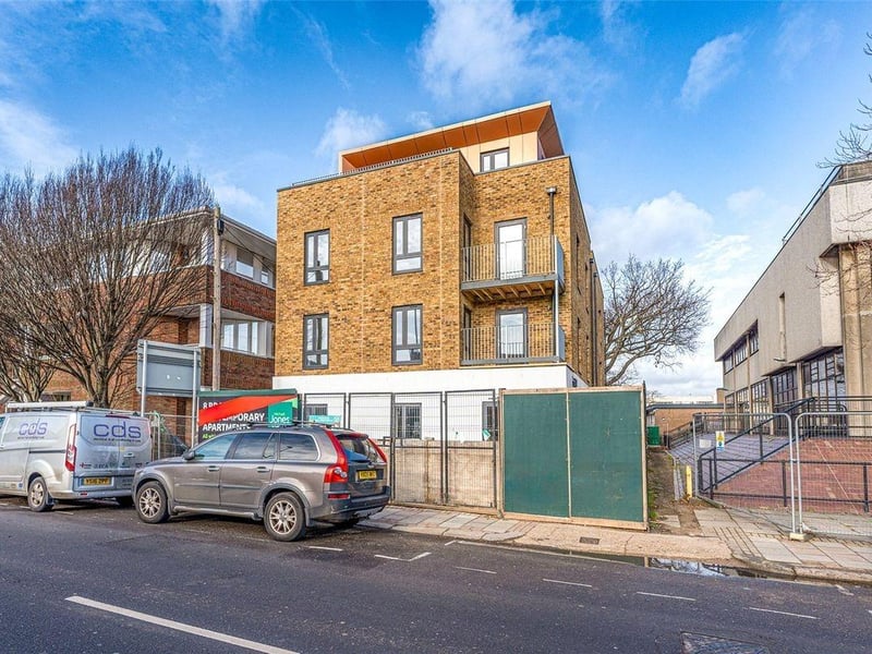The penthouse, on the third floor, has three double bedrooms, a modern kitchen and bathroom, and south-facing terrace with views of the town and beyond