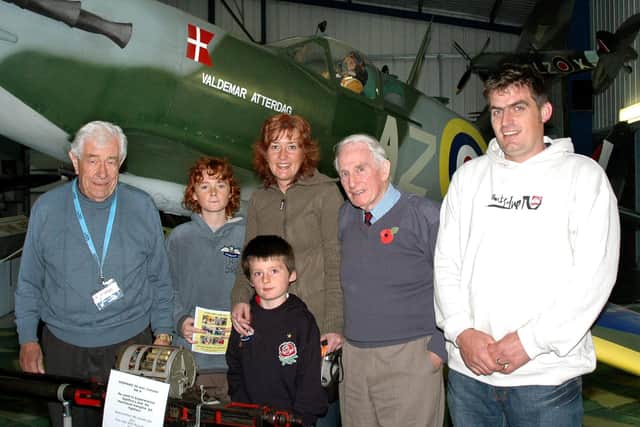 Roy Daines and Nick Berryman with the Chennell family, breaking the visitor attendance record