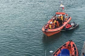 The lifeboat returning to Brighton Marina with the jet ski on Wednesday evening, August 10. Picture: Brighton RNLI