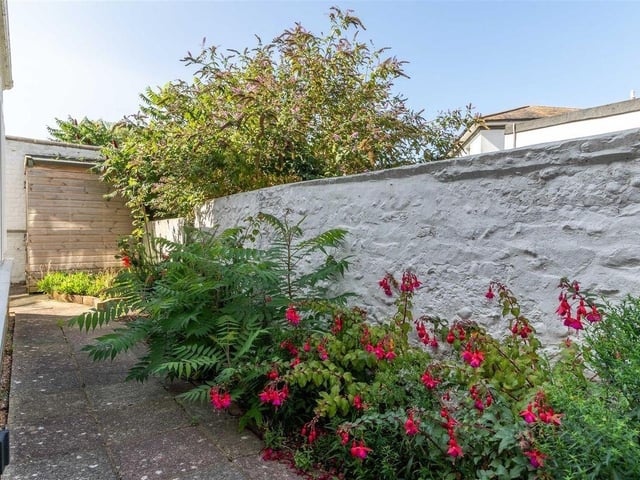 The gardens include decorative flower and shrub borders