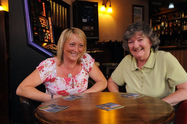 Inside the The Salisbury Arms in  Lonsdale Avenue, Cosham in 2011. Picture: (left) Landlady Chrissie Bullard with 80 year old regular (right)  Marjorie Smale. Picture: Malcolm Wells (112400-3595)