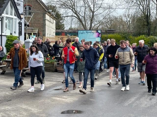 Every year, participants collect their beer and race around one-and-half miles through the village, from the pub to the mill on Station Road.