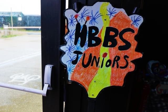 The juniors designed their own banner