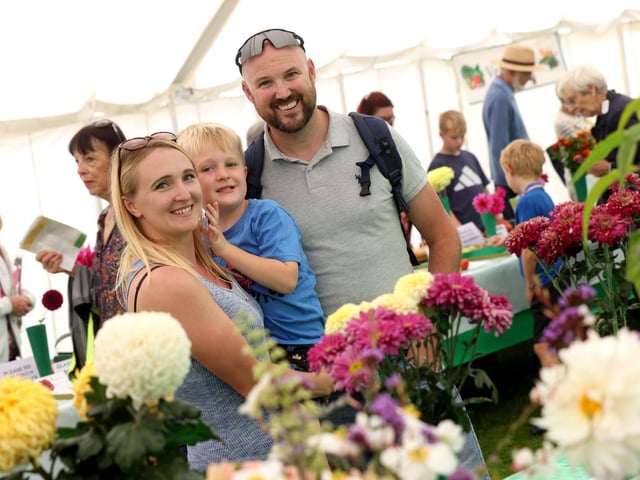 The Emsworth Show taking place on August Bank Holiday Monday in the sunshine. Pictured is (L-R) Lyz Parris holding Logan, 5, and Marc Albrecht.
Monday 28th August 2023.
Picture: Sam Stephenson.