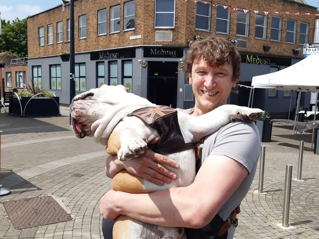 Arthur the bulldog with Crow Coffee's owner David Taylor