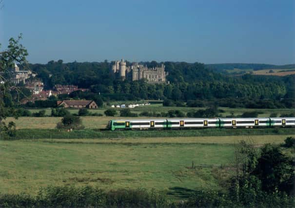 Southern Railway train with Arundel Castle in the background