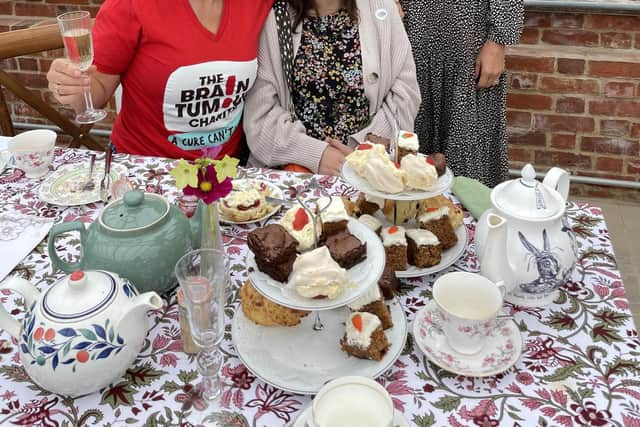 Chloe is pictured with  mum, Julie Bain; Claire Howell, regionalcommunity fundraiser for The Brain Tumour Charity and Lucinda Watkinson, owner of Somersbury Barn. Photo contributed