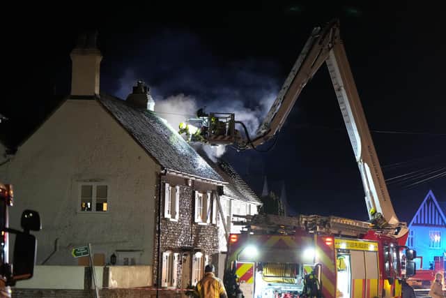 Firefighters, wearing breathing apparatus, extinguished the blaze in the roof space of the property by 2am. Crews remained at the scene the following day to dampen down hotspots and ‘carry out salvage operations’. Photo: Eddie Mitchell