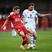 Dion Conroy, pictured in action earlier in the season against MK Dons, said Crawley Town can 'take some positives' from their defeat at third-placed Crewe Alexandra. Picture by Mike Hewitt/Getty Images