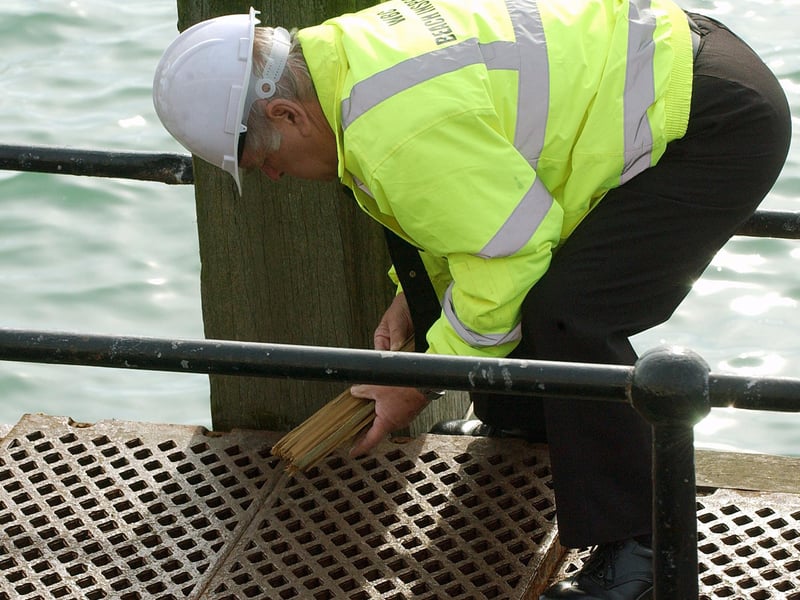 Inspecting the damage to Worthing Pier in September 2008