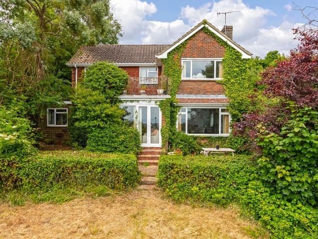 This substantial detached family house sits on the highest point in North Lancing, with grounds totalling 0.5 acres of land. Offers in the region of £1million are invited for this four-bedroom property at the foot of the South Downs National Park, with magnificent panoramic coastal views.