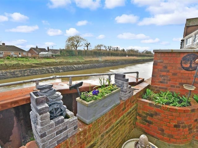 This two-bedroom cottage is on the market at £600,000 with Cubitt & West. This is a rare opportunity to own a charming riverside cottage within the desirable conservation area of historic Arundel.