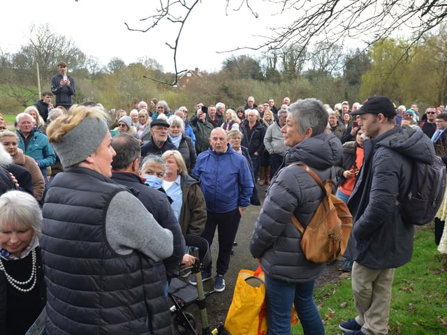 Public gathering by the gates of the Northeye site in Bexhill on Saturday April 1.