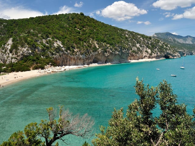 Spiaggia di Cala Rossa is a beach on the tiny Italian island of Favignana, just off the coast of Sicily. According to reviewers it's not the easiest place to get to, but is well worth the effort.