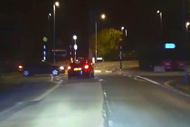 A dangerous driver who crashed into a hedge in Brighton has been sentenced. Photo: Still from Sussex Police video