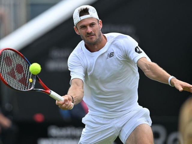 US player Tommy Paul returns to Argentina's Francisco Cerundolo during their men's singles final tennis match at the Rothesay Eastbourne International tennis tournament in Eastbourne, southern England, on July 1, 2023. (Photo by Glyn KIRK / AFP) (Photo by GLYN KIRK/AFP via Getty Images):Action from Saturday's finals at the Rothesay tennis international at Devonshire Park, Eastbourne