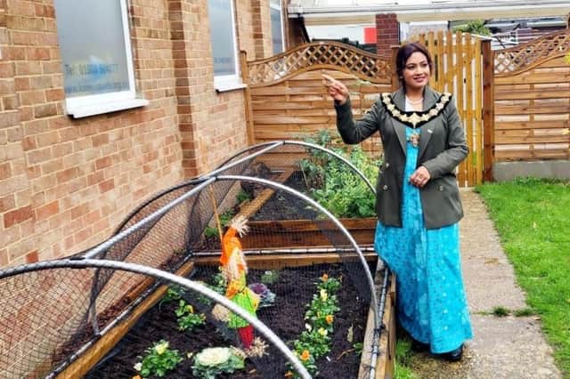 Worthing mayor Henna Chowdhury opening the vegetable garden