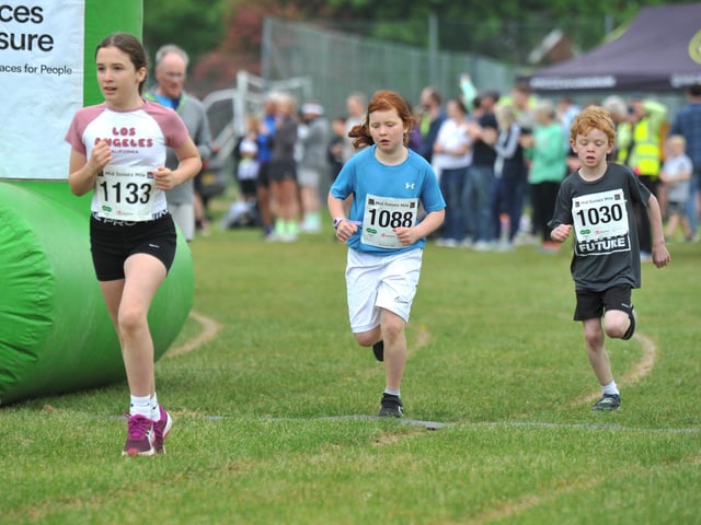 Burgess Hill 10k section of the May bank holiday weekend Mid Sussex Marathon.
Event - Burgess Hill Mid Sussex Mile.
HR26050501. Pic Hollie R/Iconic Media Group : Burgess Hill races at the 2026 Mid Sussex Marathon