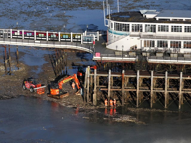 With full repair works unable to start until mid-November, the council is 'having an interim repair done' to help the remaining piles to support the weight of the pier.