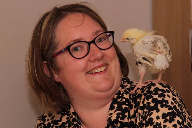 Kirsty Farmer, Client Relationship Assistant, with one of the chicks
