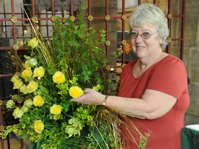 St Mary's Church, Horsham, flower festival. Val Burgess with her Golden Jubilee arrangement