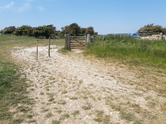 You will pass through a gate that has two arrows, take the right hand path.