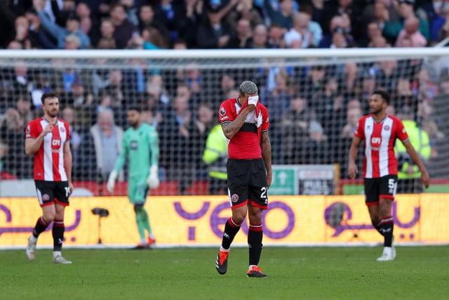 SHEFFIELD, ENGLAND - FEBRUARY 18: Vinicius Souza looks dejected after an own goal by Jack Robinson of Sheffield United (obscured) during the Premier League match between Sheffield United and Brighton & Hove Albion at Bramall Lane on February 18, 2024 in Sheffield, England. (Photo by Matt McNulty/Getty Images)