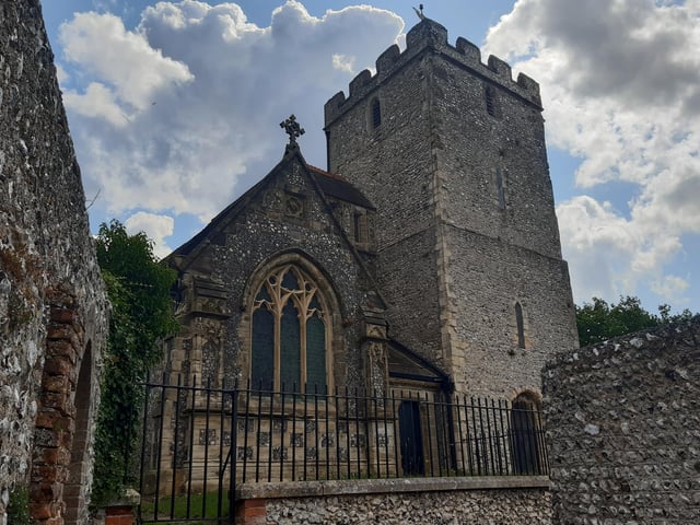 Continue by following the path to the right, through the churchyard