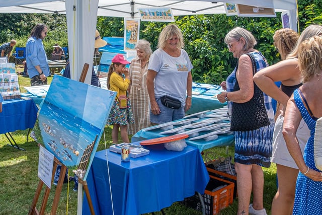 A stall selling paintings at the Felpham Village Fete. Photo: Tony Lord