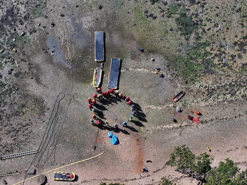Both agencies worked together to rescue casualties from mud.