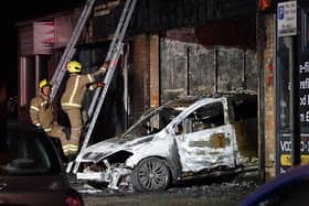 Emergency services called after car collides into building in Seaford