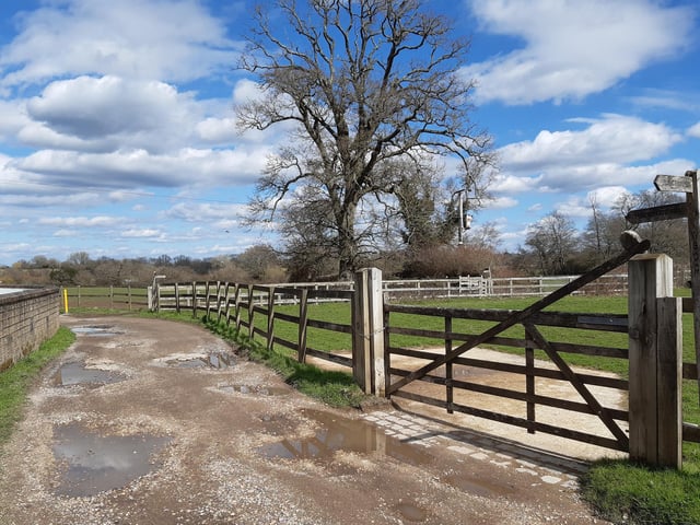 Follow the footpath signs through the stables