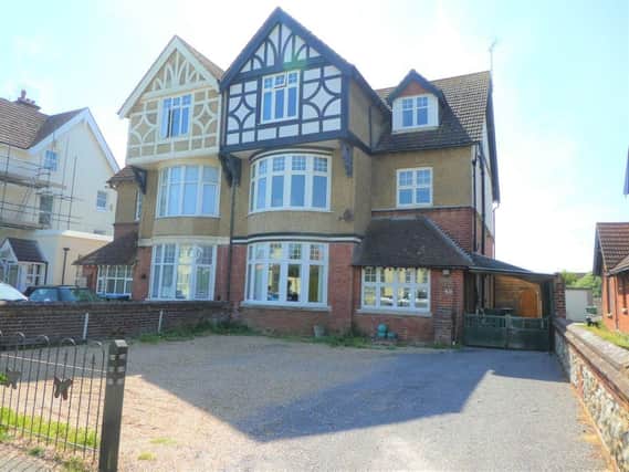 The former Butterfly House Day Nursery in Littlehampton is a five-bedroom, semi-detached house that is now on the market with Martin & Co at £695,000