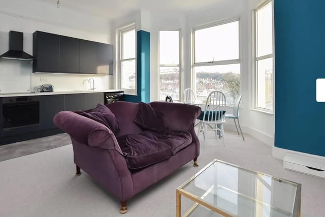 The flat offers open plan living