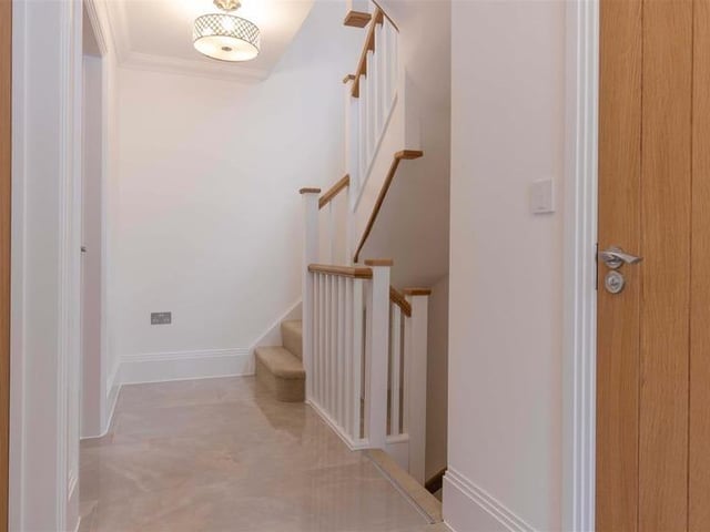 Offers in excess of £900,000 are invited for this new luxury property in Mill Lane, High Salvington. It has beautiful views over the South Downs, versatile and spacious accommodation.