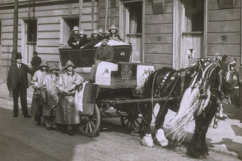 Collecting in Plymouth in 1939, with a horse towing a small boat with six children wearing kapok lifejackets and rain hats