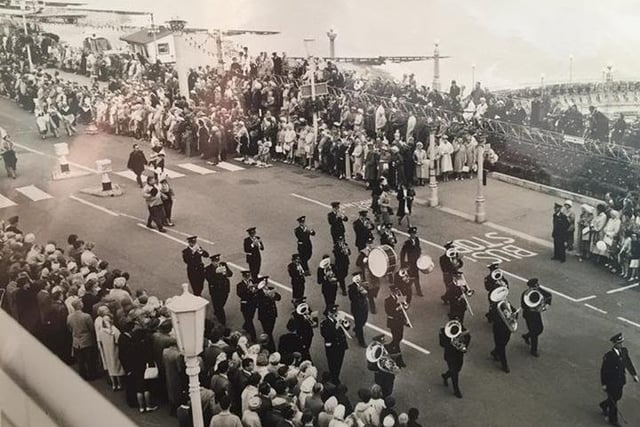 Eastbourne Silver Band in the parade passing the bandstand