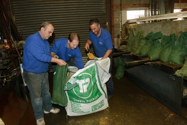 Filling sandbags at Riverside Sheetmetal and Fabrication after flooding at Riverside Industrial Estate Littlehampton, on Friday, December 6, 2013