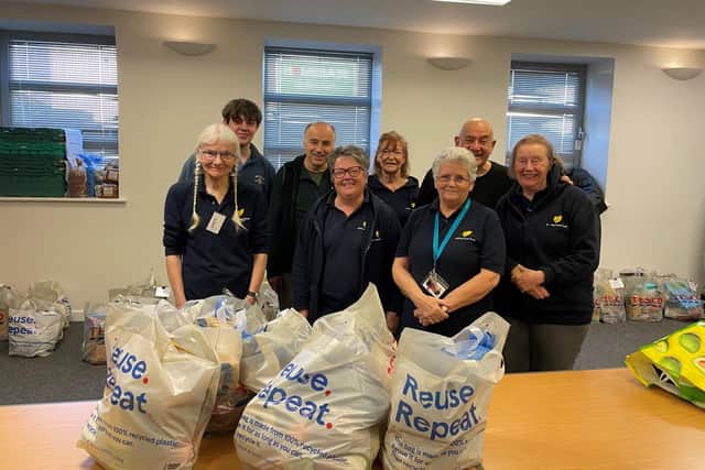 King’s Church members with surplus items for Sussex people