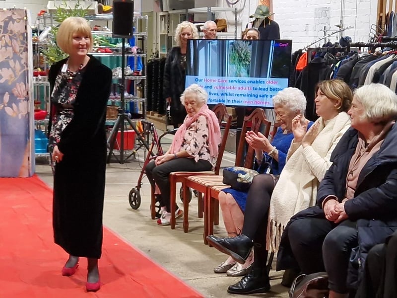 Tina from the finance team wore a long black velvet coat with red lining from Per Una, priced at £30