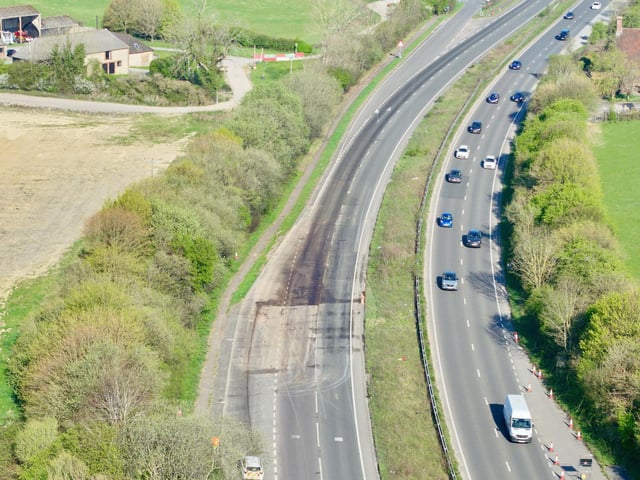 A major West Sussex road was closed northbound after a fuel spill.
