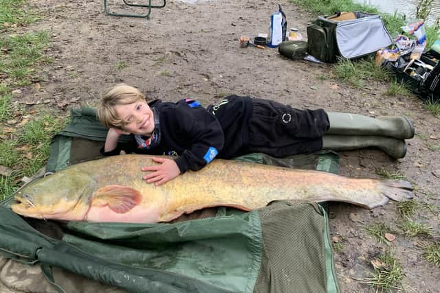 Finnegan Kelly, nine, caught a massive catfish at Latchetts Lakes last weekend