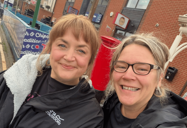 Manager at the Garden Bar snaps a photo with Ruth Jones