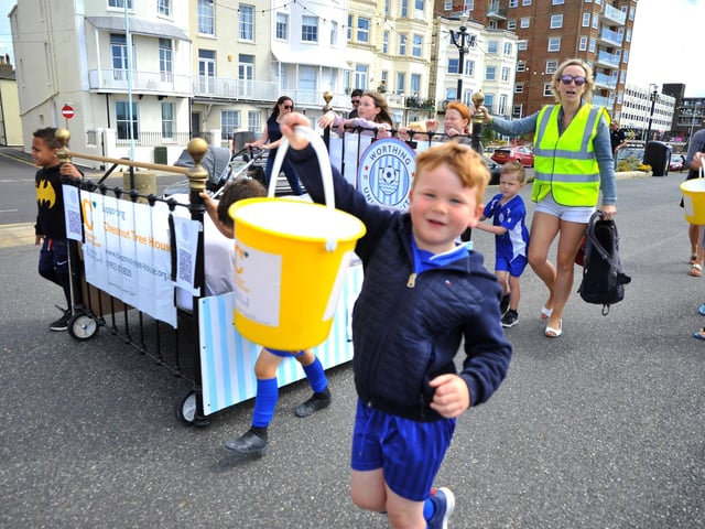 Worthing United Youth Football Club’s 30 teams took turns to push a bed along Worthing seafront to raise money for Chestnut Tree House